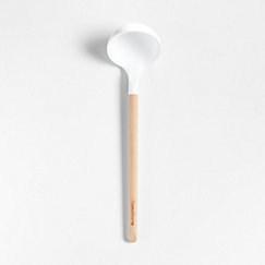 https://cb.scene7.com/is/image/Crate/CrateKtchnSlWdLadleWhtSSS22/$web_LineItem$&wid=243&hei=243/220106113034/silicone-and-wood-ladle-white.jpg