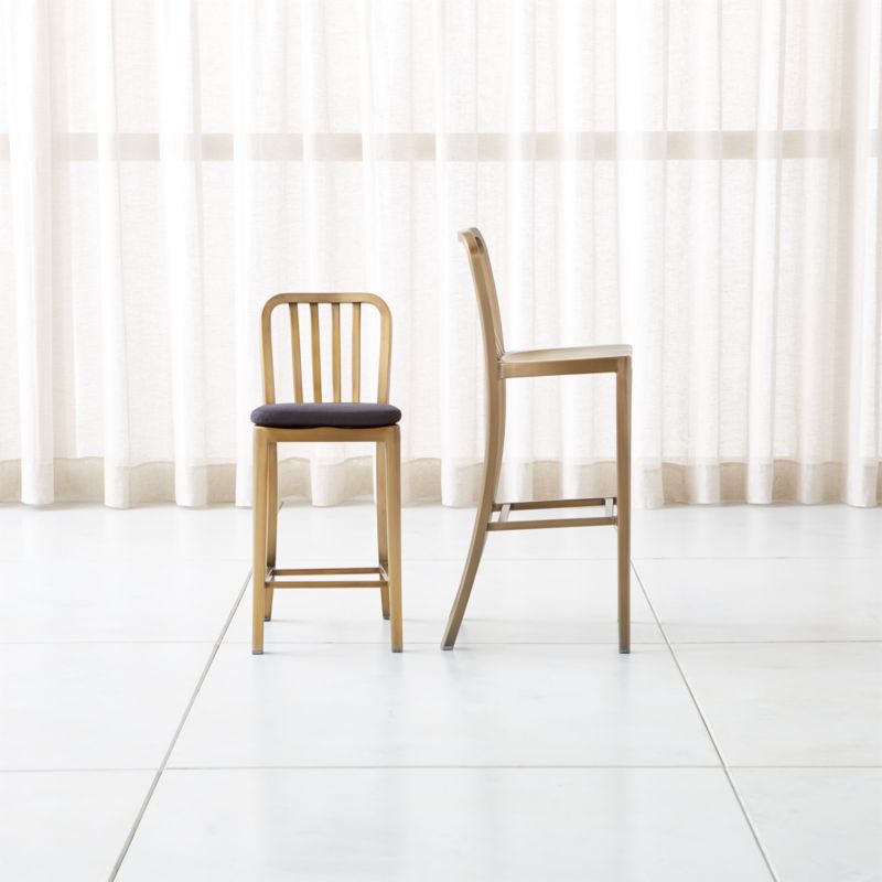 Crate Barrel Delta Brass Counter Stool with Alloy Grey Cushion The Shops at Willow Bend