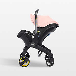 https://cb.scene7.com/is/image/Crate/DoonaInfStBsStrlrPKSSF23_VND/$web_plp_card_mobile$/231019184447/doona-blush-pink-compact-infant-car-seat-and-stroller-with-base.jpg