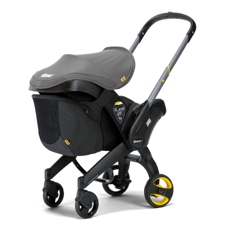 Doona ™ Blush Pink Compact Infant Car Seat & Stroller with Base