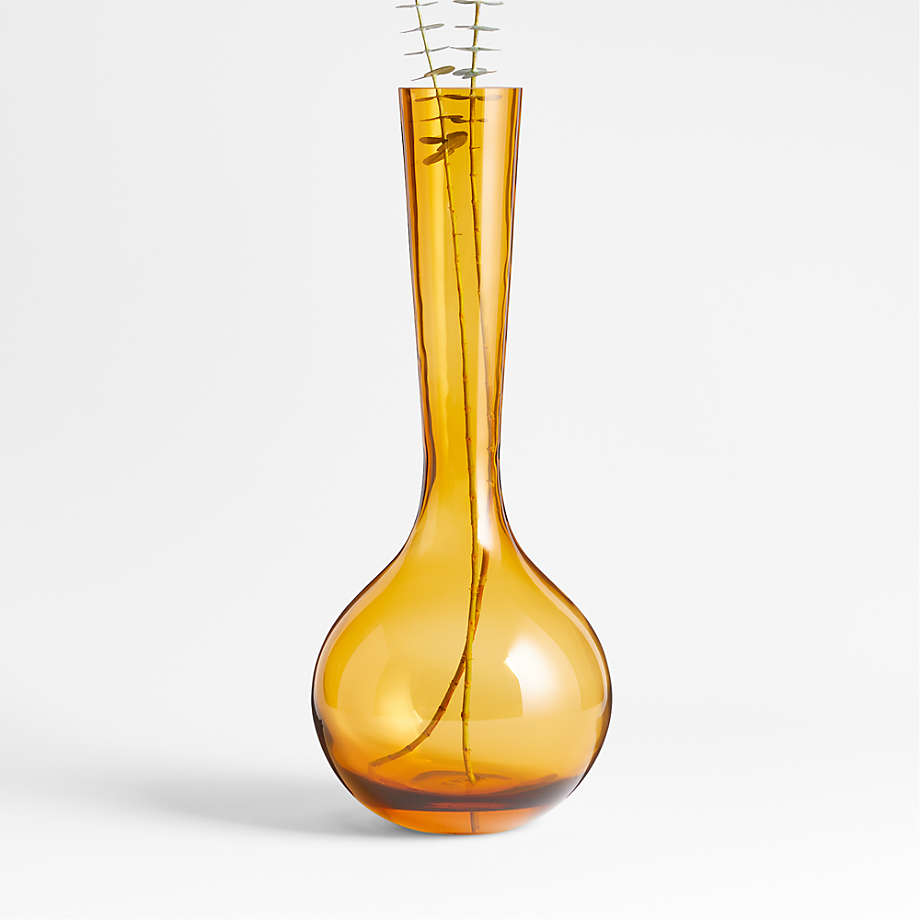 https://cb.scene7.com/is/image/Crate/DyonVaseLargeAmber19inSSF23/$web_pdp_main_carousel_med$/230411170021/dyon-large-amber-glass-vase-19.jpg