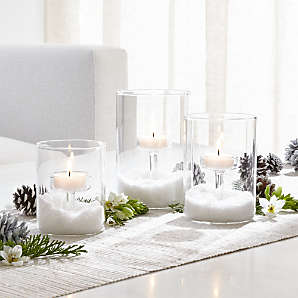 https://cb.scene7.com/is/image/Crate/ElsaTealightGroupHolidayFHS19/$web_plp_card_mobile$/190411135025/elsa-glass-tea-light-candle-holders.jpg