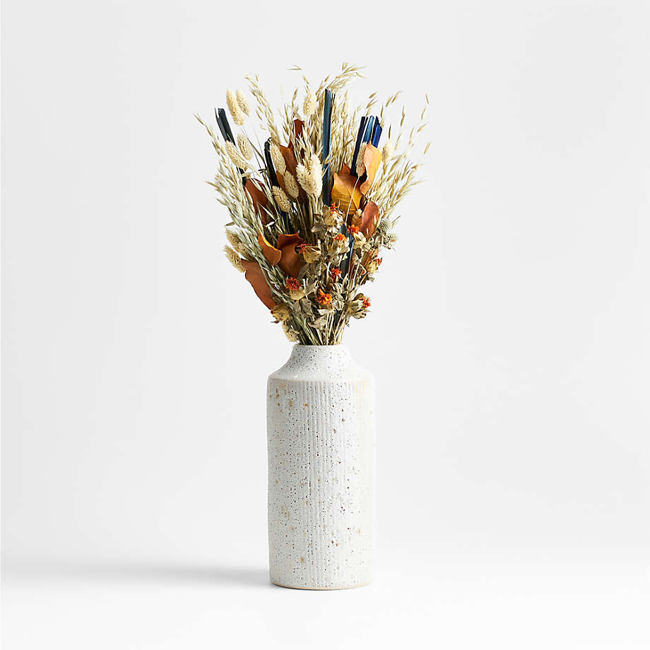 https://cb.scene7.com/is/image/Crate/EmaCrmWhVsDrdThstPdBqtArngSSF23/$web_pdp_main_carousel_med$/230515164017/ema-ceramic-white-vase-and-dried-thistle-and-pod-bouquet.jpg