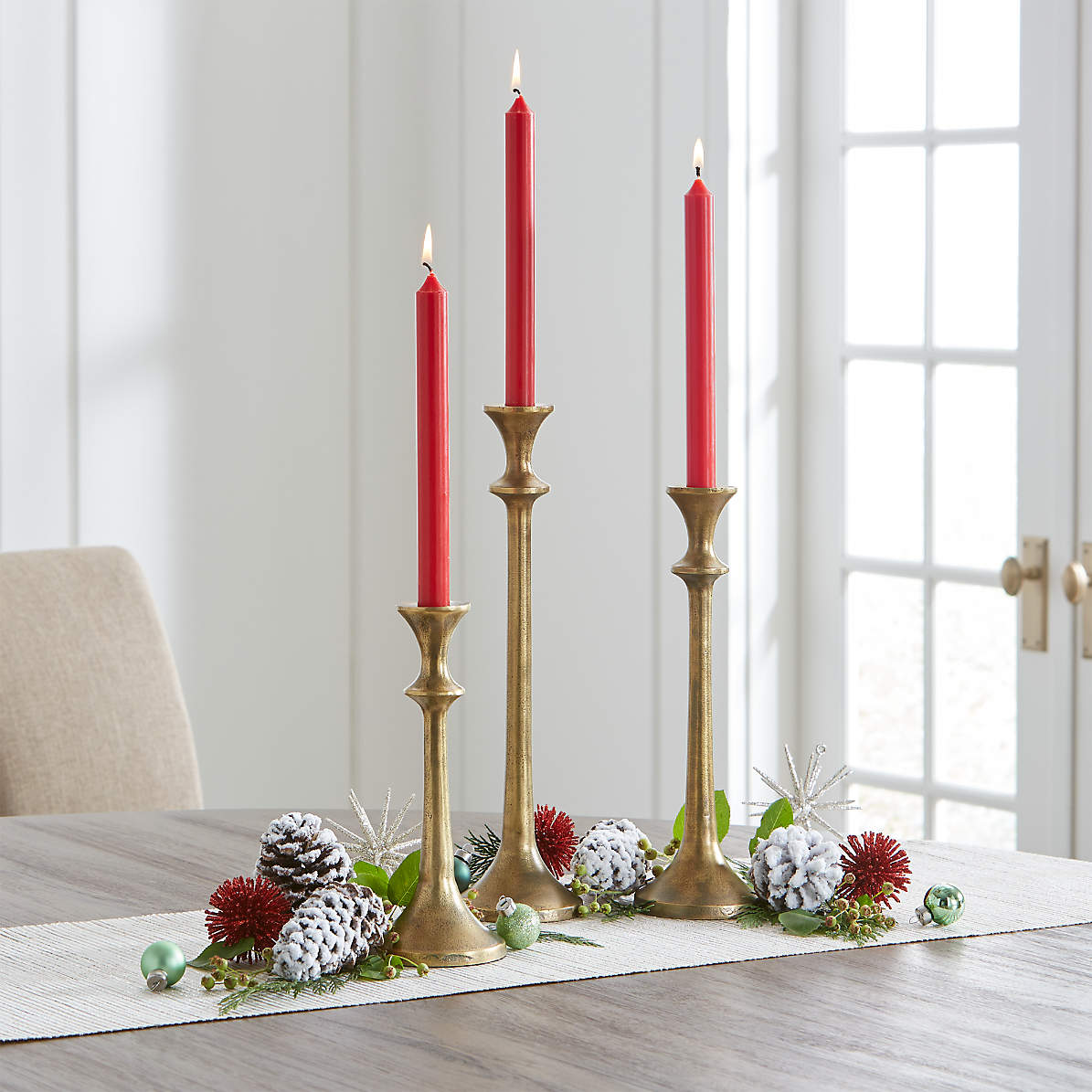CB2 - July Catalog 2019 - Arya Antique Brass Taper Candle Holder