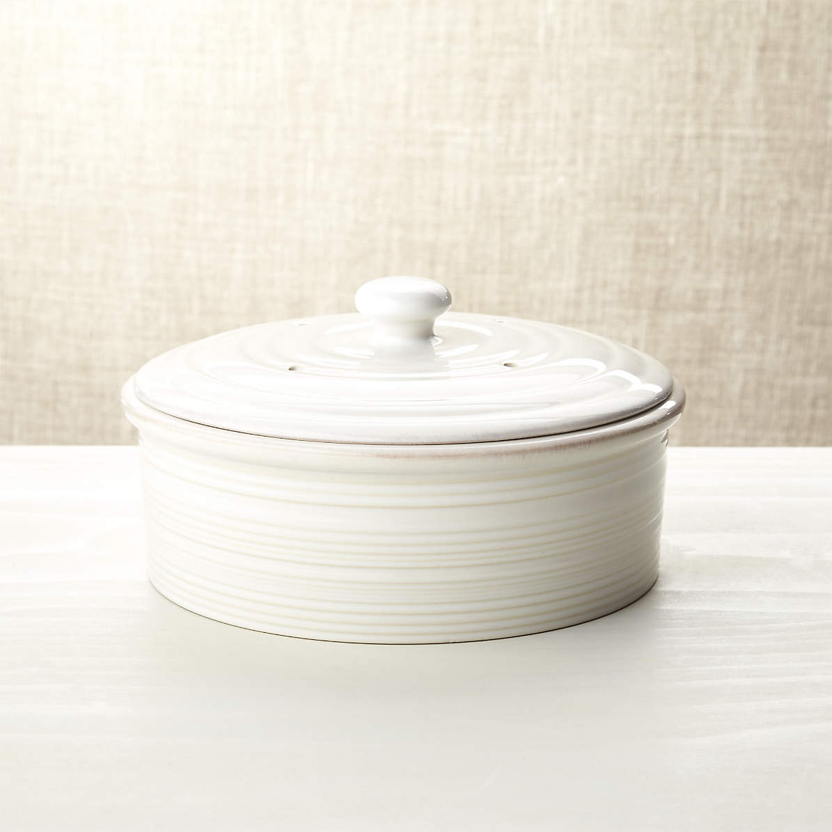 white ceramic tortilla warmer