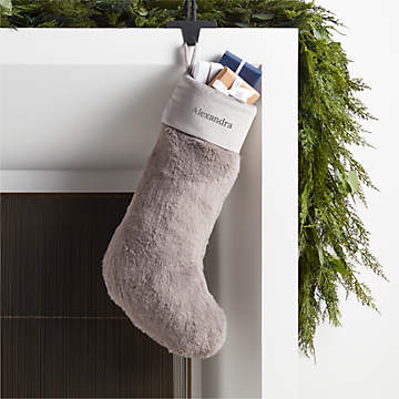 https://cb.scene7.com/is/image/Crate/FauxFurStockingGreyPRSHF23/$web_recently_viewed_item_sm$/230911114230/glacial-grey-faux-fur-christmas-stocking.jpg