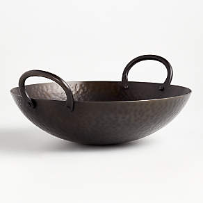 https://cb.scene7.com/is/image/Crate/FeastBowlSSS20/$web_pdp_carousel_low$/200227132540/feast-hammered-iron-serving-bowl.jpg