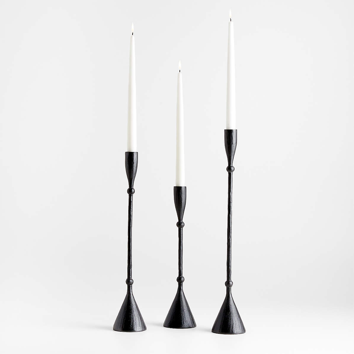 https://cb.scene7.com/is/image/Crate/FerricMtlTaperHldrS3SSS24/$web_pdp_main_carousel_zoom_med$/231016150228/ferric-black-metal-taper-candle-holders.jpg