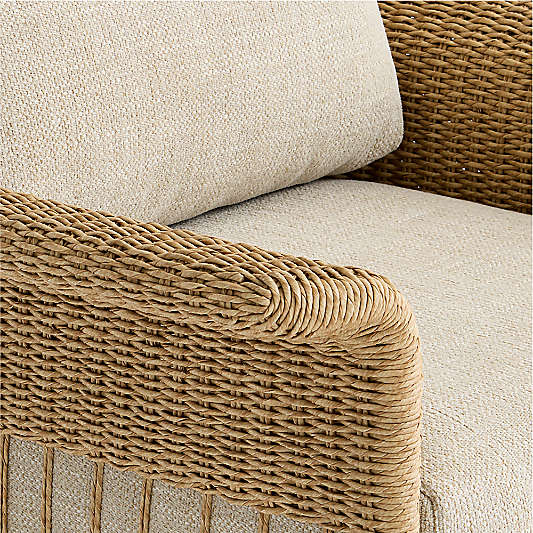 Fiji Wicker Swivel Outdoor Lounge Chair with Ivory Cushion