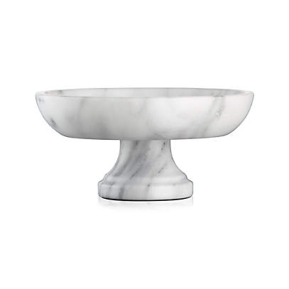 white ceramic pedestal fruit bowl