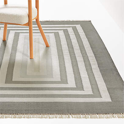 https://cb.scene7.com/is/image/Crate/GroovyTuesdayGrey5x8RugSSS22/$web_pdp_main_carousel_low$/220513164458/groovy-tuesday-handwoven-grey-geometric-rug.jpg