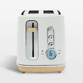 https://cb.scene7.com/is/image/Crate/HadenDrch2slTstMtWhSSS23_VND/$web_pdp_carousel_low$/230426140412/haden-dorchester-matte-white-2-slice-toaster.jpg