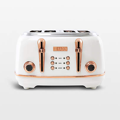https://cb.scene7.com/is/image/Crate/HadenHr4slTstrIvCpSSF22_VND/$web_pdp_main_carousel_low$/221028160646/haden-hertitage-ivory-and-copper-4-slice-toaster.jpg