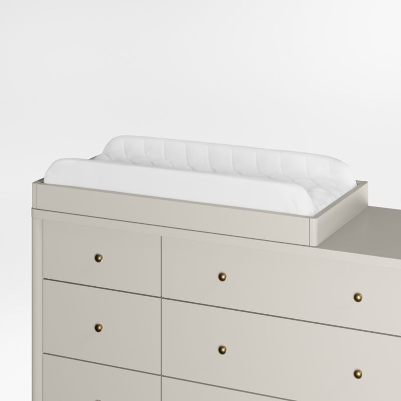 https://cb.scene7.com/is/image/Crate/HampshireRDGBbChTbTpAV2SSF23_3D/raw/231027174706/hampshire-rainy-day-grey-wood-baby-changing-table-topper.jpg