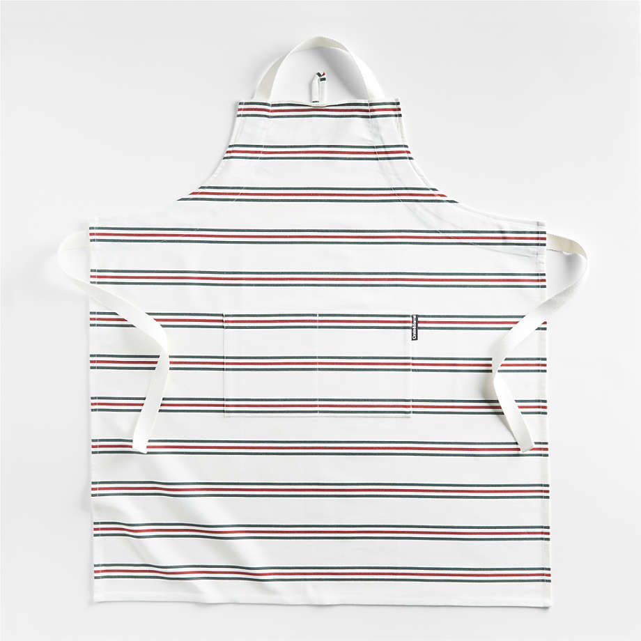 https://cb.scene7.com/is/image/Crate/HolidayStripeApronSHF23/$web_pdp_main_carousel_med$/230705114852/holiday-stripe-organic-cotton-apron.jpg