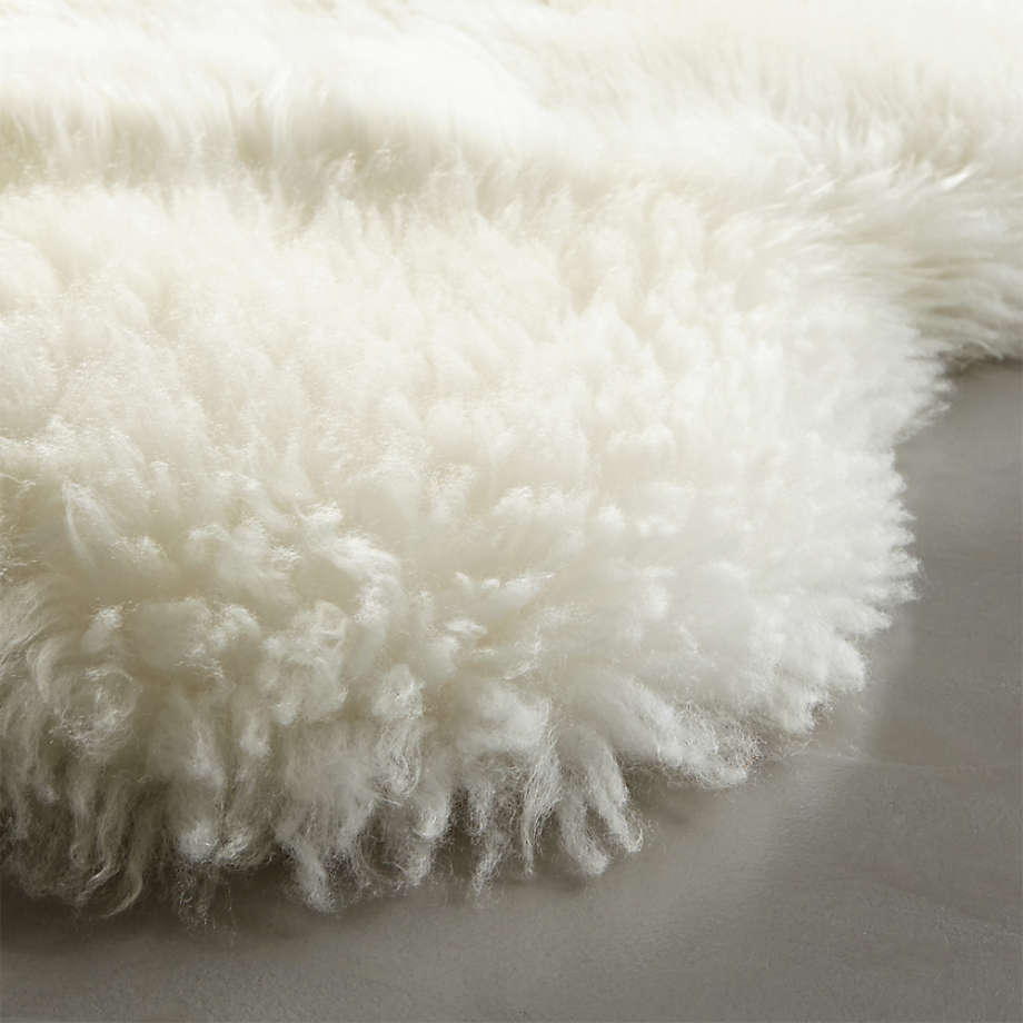 Ivory sheepskin throw hot sale