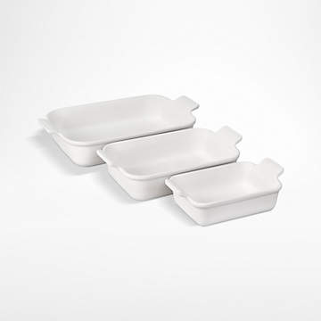 https://cb.scene7.com/is/image/Crate/LeCreuHrtRcDshS3WhtSSS23_VND/$web_recently_viewed_item_sm$/230224135304/le-creuset-set-of-3-heritage-rectangular-dishes-white.jpg