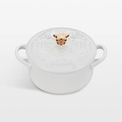 https://cb.scene7.com/is/image/Crate/LeCreuMCctStrKnbWhtSSF23_VND/$web_pdp_main_carousel_low$/230912164330/le-creuset-mini-noel-cocotte-with-star-knob-white.jpg