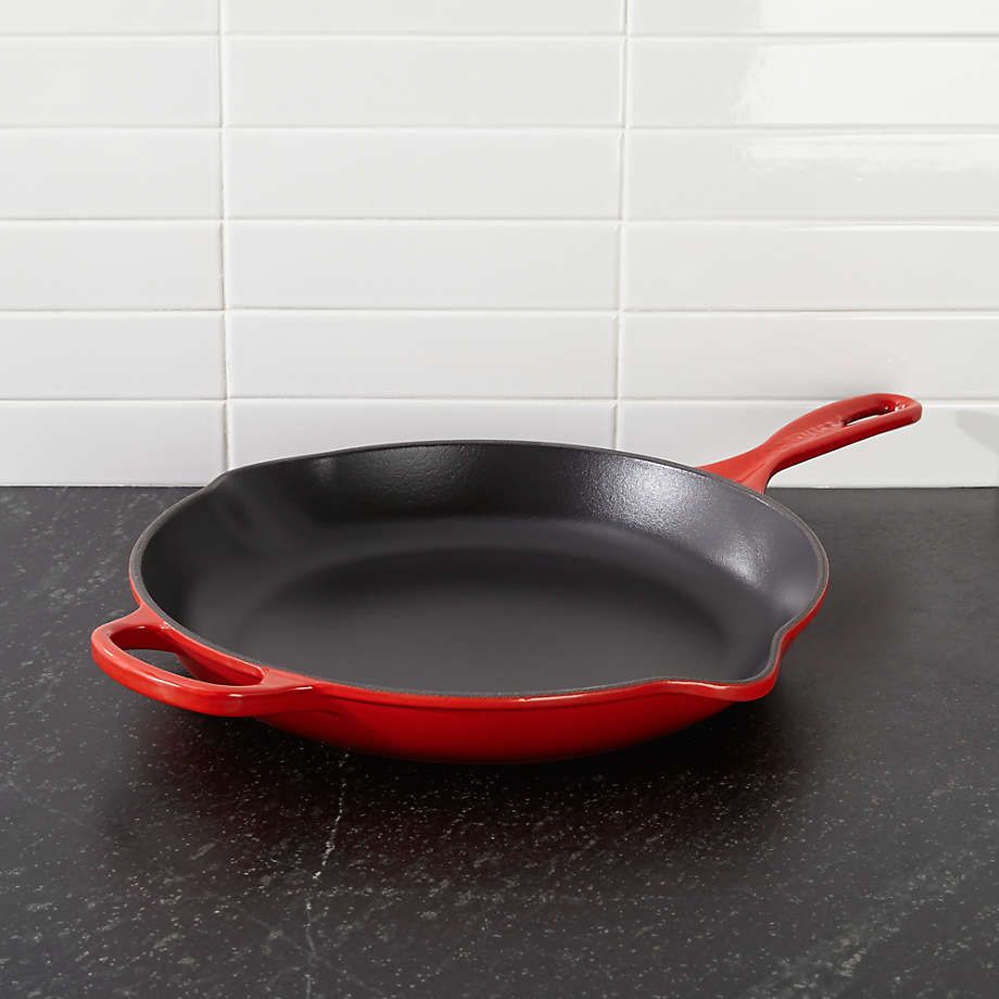 https://cb.scene7.com/is/image/Crate/LeCreuSg11p75inSklltCrsSHF18/$web_pdp_main_carousel_med$/220913143718/le-creuset-signature-cerise-11.75-skillet.jpg