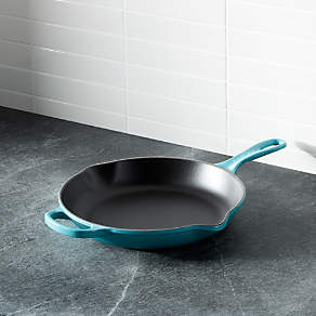 https://cb.scene7.com/is/image/Crate/LeCreuSig10inSkilletCaribSHF16/$web_pdp_carousel_low$/220913133313/le-creuset-signature-10-caribbean-skillet.jpg