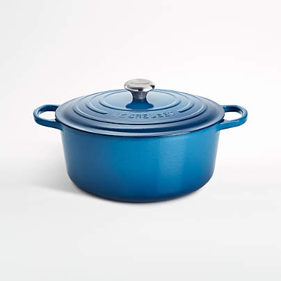 https://cb.scene7.com/is/image/Crate/LeCreuSigRndFchOv9qtMrslleSSF20/$web_pdp_carousel_med$/201027144406/le-creuset-signature-9-qt.-round-marseille-blue-dutch-oven-with-lid.jpg