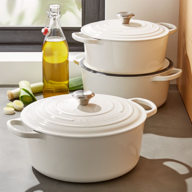 Le Creuset ® Signature Round Cream French Ovens with Lid  Enameled cast  iron cookware, Cool kitchens, Crate and barrel