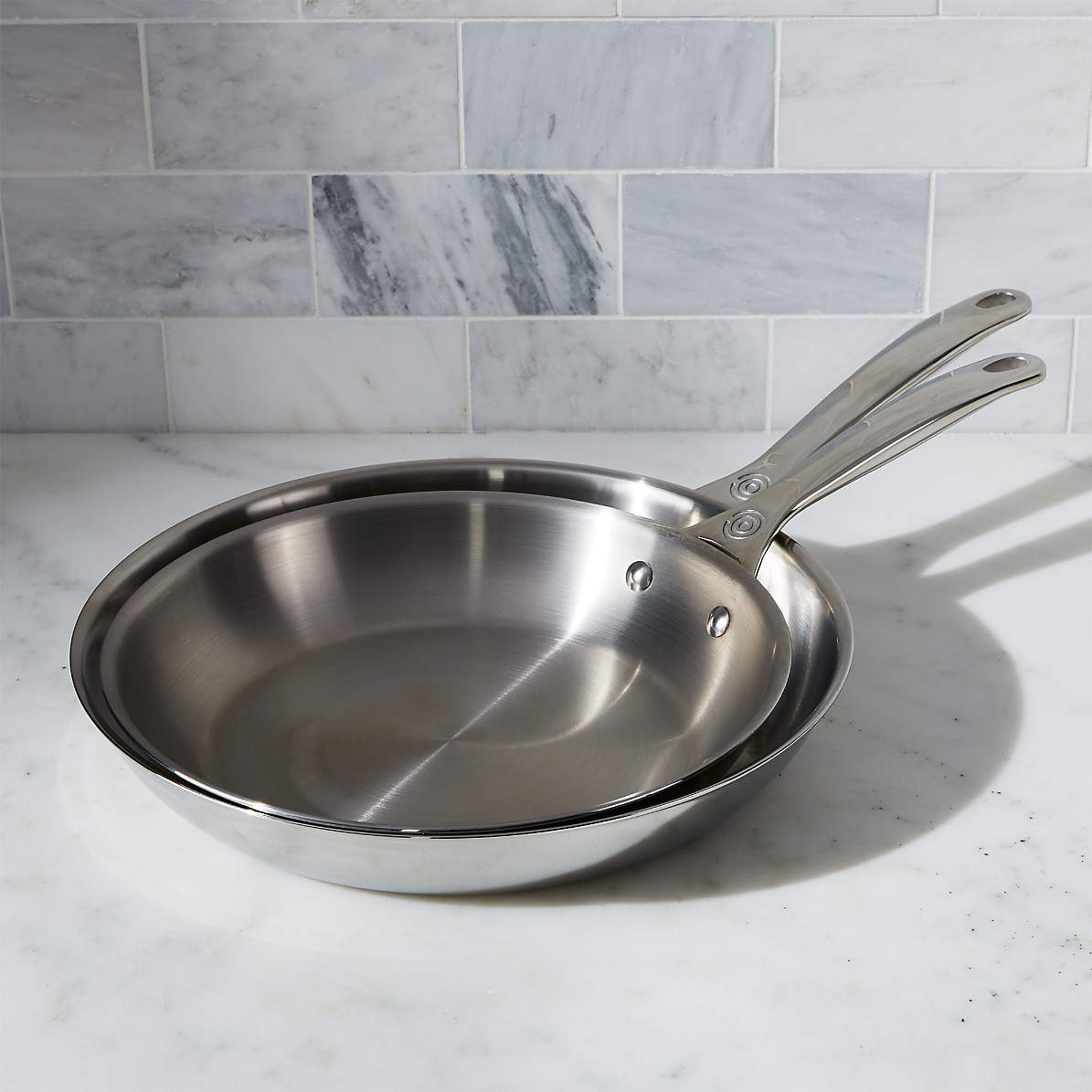 Le Creuset ~ Stainless Steel ~ 6 Piece Set (8 Nonstick Fry Pan, 10 Fry Pan,  2 qt. Saucepan w/ Lid & 3.5 qt. Nonstick Saucier Pan with Lid), Price  $525.00 in Pittsburgh, PA from Contemporary Concepts