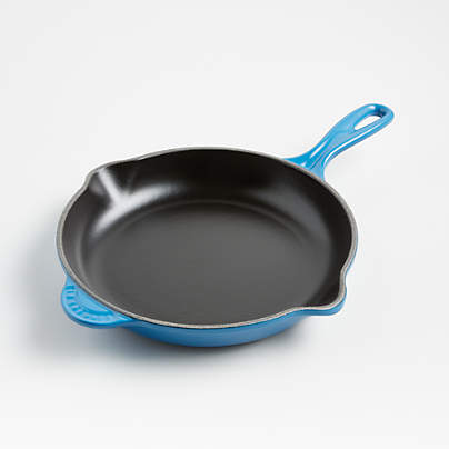 https://cb.scene7.com/is/image/Crate/LeCreusetClsc9inSkilletMrsSSF22/$web_pdp_carousel_med$/220712162349/le-creuset-classic-9-marseille-blue-enameled-cast-iron-skillet.jpg