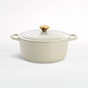 https://cb.scene7.com/is/image/Crate/LeCreusetFrOvRd7p25CrmSSF20/$web_pdp_carousel_low$/200728121451/le-creuset-signature-7.25-qt.-round-cream-dutch-oven-with-lid.jpg