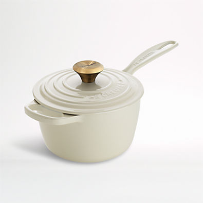 View Le Creuset ® Signature 1.75-Qt. Cream Enameled Cast Iron Saucepan with Lid details