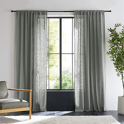 https://cb.scene7.com/is/image/Crate/LindstromOrg52x96CrtPnPGSSS23/$web_pdp_main_carousel_low$/230327165534/lindstrom-pebble-grey-organic-cotton-sheer-window-curtain-panel.jpg