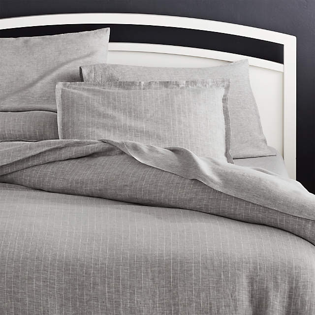 https://cb.scene7.com/is/image/Crate/LinenPnstrpGyFQDvtCvrSHS19/$web_pdp_main_carousel_zoom_low$/220913144047/linen-pinstripe-grey-duvet-covers-and-pillow-shams.jpg