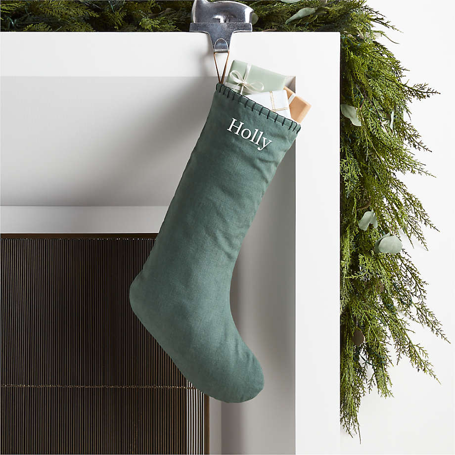 https://cb.scene7.com/is/image/Crate/LinenStockingSolidGreenPRSHF23/$web_pdp_main_carousel_med$/230914125357/solid-green-european-flax--certified-linen-christmas-stocking.jpg