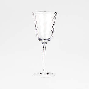 https://cb.scene7.com/is/image/Crate/LuciaWhiteWineGlassAVSSF21/$web_pdp_carousel_low$/211008150239/lucia-tulip-white-wine-glass.jpg