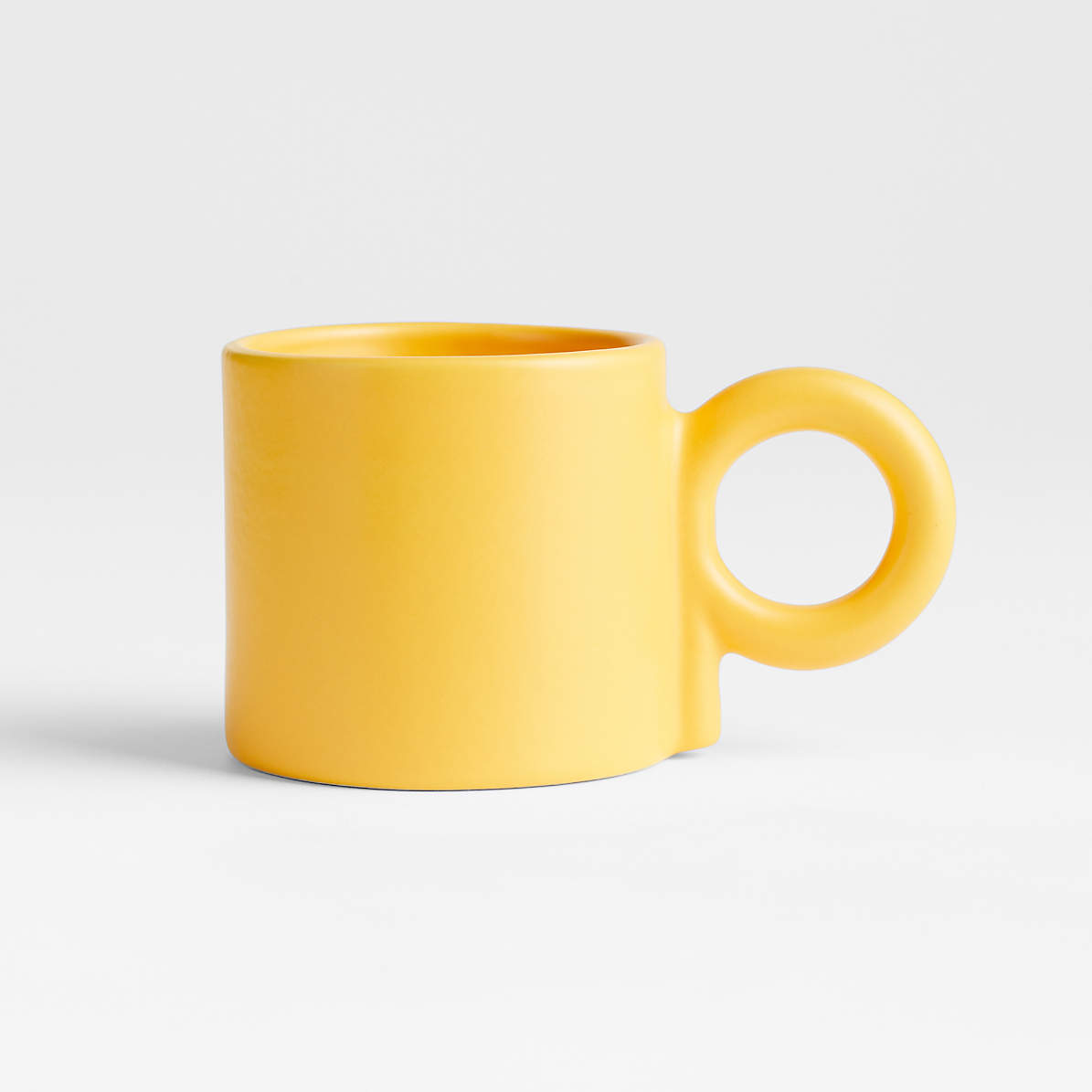 https://cb.scene7.com/is/image/Crate/MBTheCoffeeMugMustardSSS23/$web_pdp_main_carousel_zoom_med$/230316115022/egg-yolk-yellow-stoneware-mug-by-molly-baz.jpg