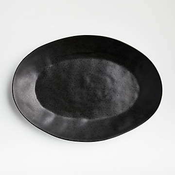 https://cb.scene7.com/is/image/Crate/MarinBlk15p75OvalPlatterSSS20/$web_recently_viewed_item_sm$/200211165257/marin-matte-black-oval-platter.jpg