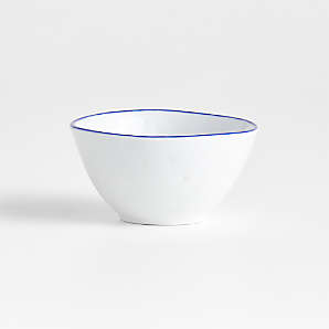 https://cb.scene7.com/is/image/Crate/MercerBlueRimMiniBowlSSS24/$web_plp_card_mobile$/231019034952/mercer-blue-rim-porcelain-mini-bowl.jpg