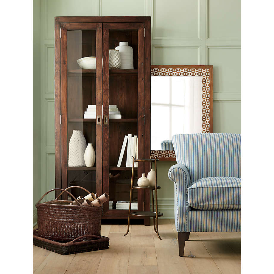 Crate and barrel shop bookcase with doors