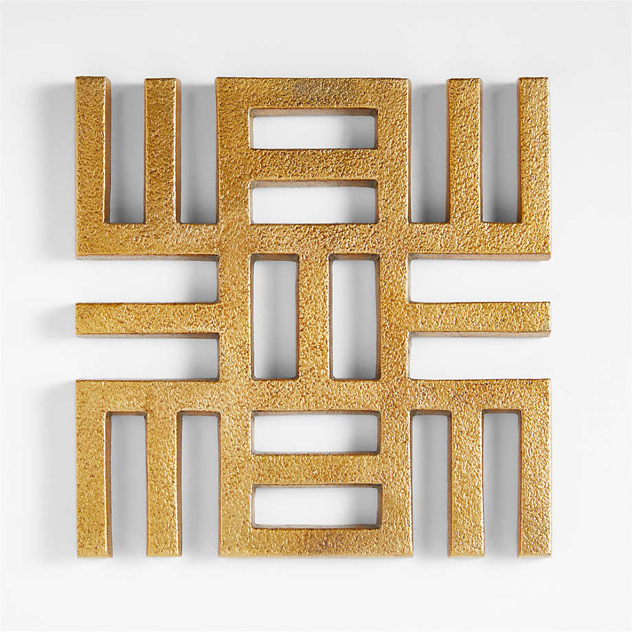 Nea Onnim Gold Metallic Trivet by Eric Adjepong | Crate & Barrel Canada