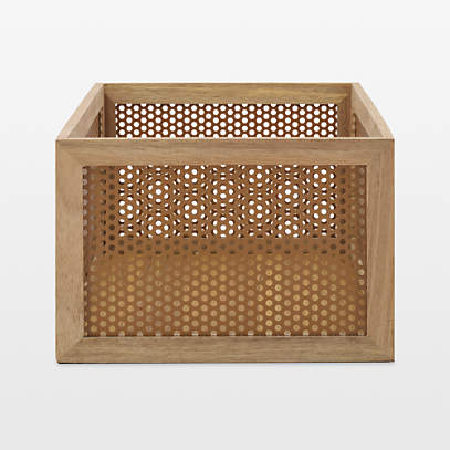 https://cb.scene7.com/is/image/Crate/NeatMthdPrfAcaBskBsSSS23_VND/$web_pdp_main_carousel_low$/230530155835/perforated-brass-acacia-wood-storage-basket.jpg