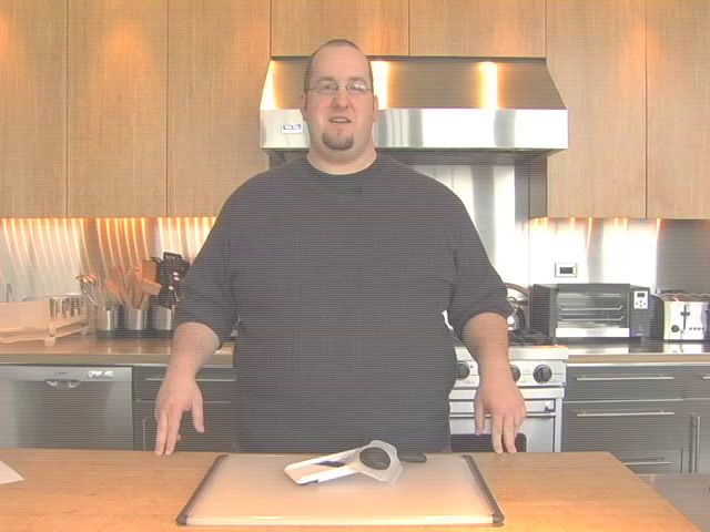 Play OXO ® Hand-Held Mandoline Slicer - video 1 of 2