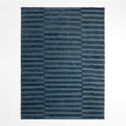 https://cb.scene7.com/is/image/Crate/OaxacaNavy9x12RugTPSSF23/$web_pdp_main_carousel_low$/230720185607/oaxaca-jute-hand-knotted-navy-blue-area-rug.jpg