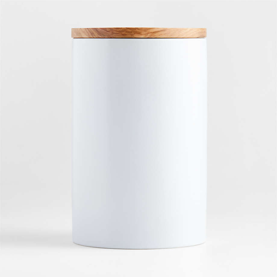 https://cb.scene7.com/is/image/Crate/OlivewoodMttCrmcCnstrXLSSF22/$web_pdp_main_carousel_med$/220401183037/olivewood-and-matte-extra-large-ceramic-canister.jpg
