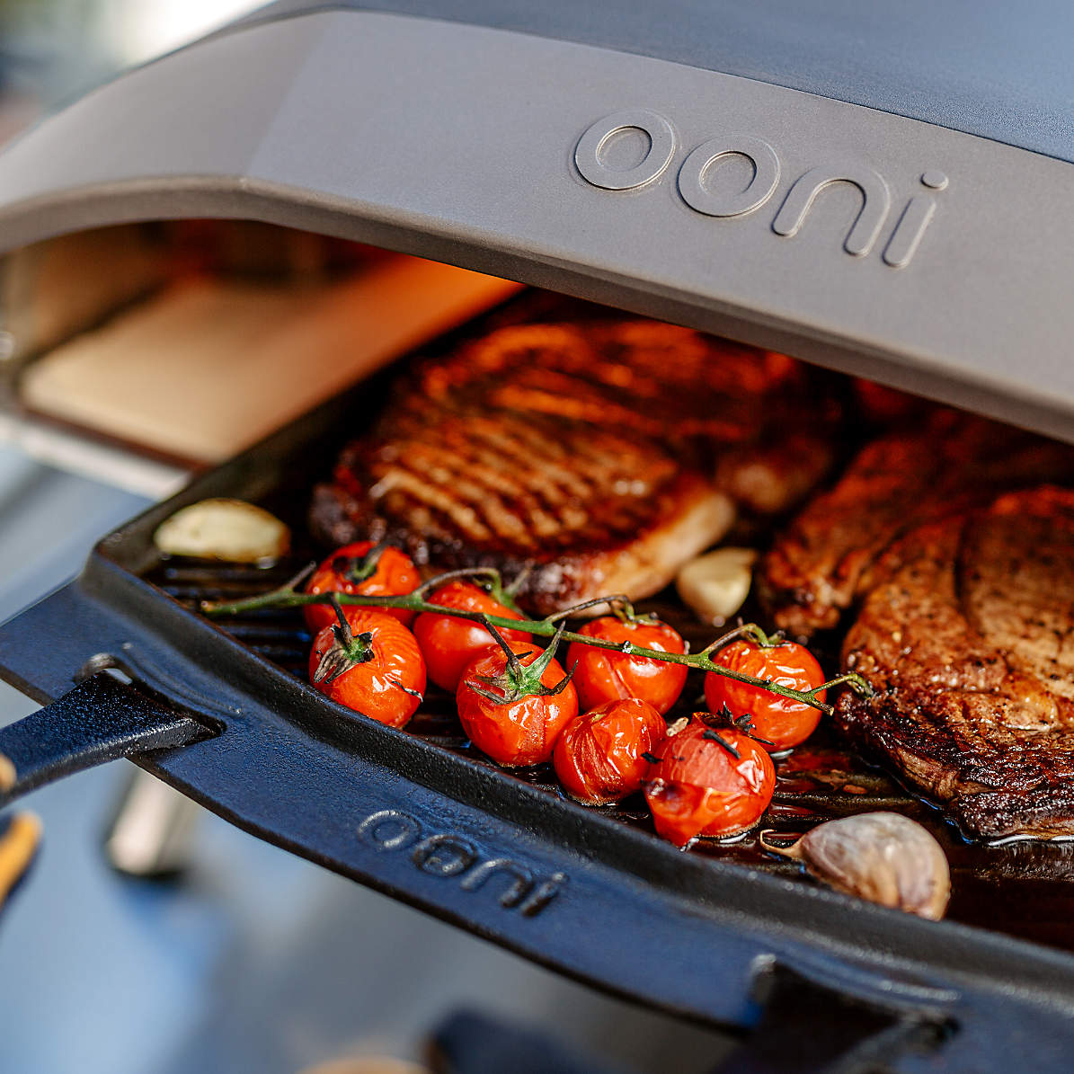 Ooni's Dual-Sided 'Grizzler' Plate works equally well for grilling