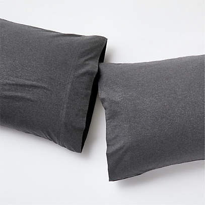 https://cb.scene7.com/is/image/Crate/OrgJerseyCharStndPlwcsSHF23/$web_pdp_main_carousel_low$/230822145300/organic-jersey-charcoal-grey-pillowcases-set-of-2.jpg