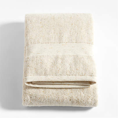 https://cb.scene7.com/is/image/Crate/OrgTurkishNFBathTowelSSF23/$web_pdp_main_carousel_low$/230501152014/organic-turkish-cotton-natural-beige-fleck-bath-towel.jpg