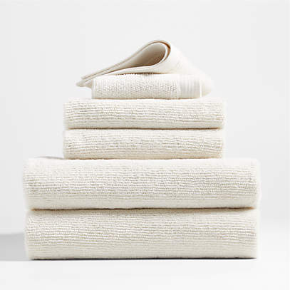 https://cb.scene7.com/is/image/Crate/OrganicAntiMicTowelsWIvrS6SSF22/$web_pdp_main_carousel_low$/220802125803/antimicrobial-organic-cotton-woolen-ivory-bath-towels-set-of-6.jpg