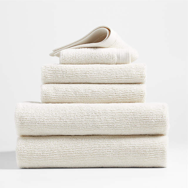 https://cb.scene7.com/is/image/Crate/OrganicAntiMicTowelsWIvrS6SSF22/$web_pdp_main_carousel_zoom_low$/220802125803/antimicrobial-organic-cotton-woolen-ivory-bath-towels-set-of-6.jpg