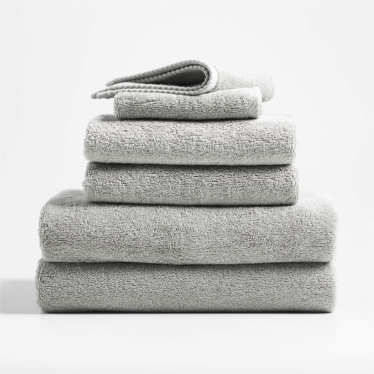 https://cb.scene7.com/is/image/Crate/OrganicQuickDryTowelsAshS6SSF22/$web_pdp_main_carousel_zoom_med$/220712150111/quick-dry-organic-cotton-ash-gray-bath-towels-set-of-6.jpg