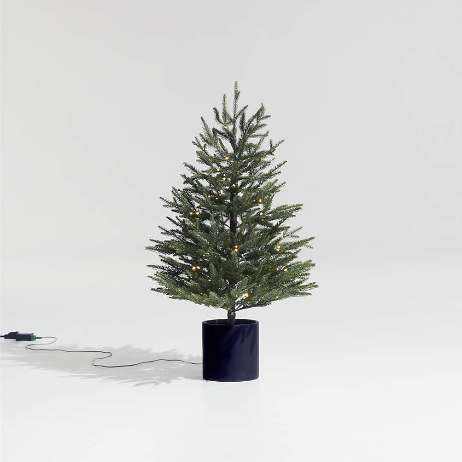 https://cb.scene7.com/is/image/Crate/PreLitNorwaySpruceTree3ftROF21/$web_pdp_main_carousel_med$/210817094843/faux-potted-norway-spruce-pre-lit-led-tree-with-white-lights-3.jpg